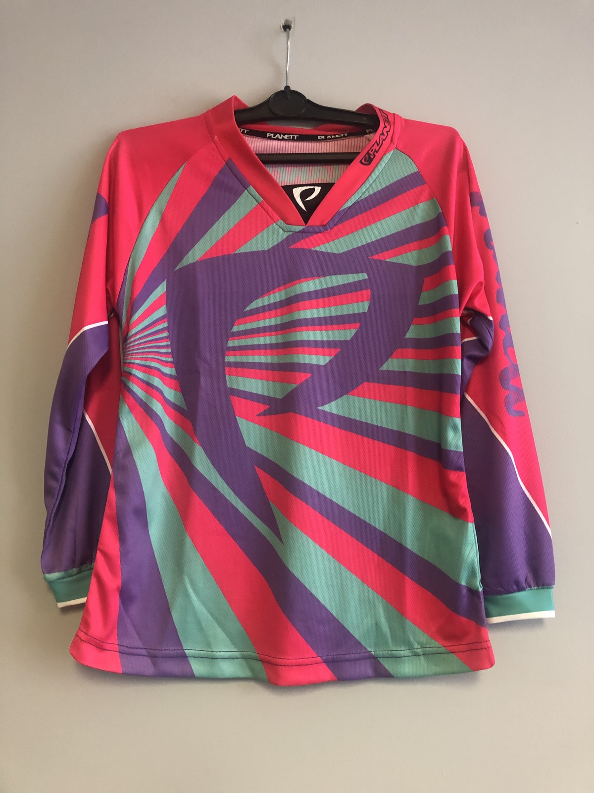 teal and pink jersey