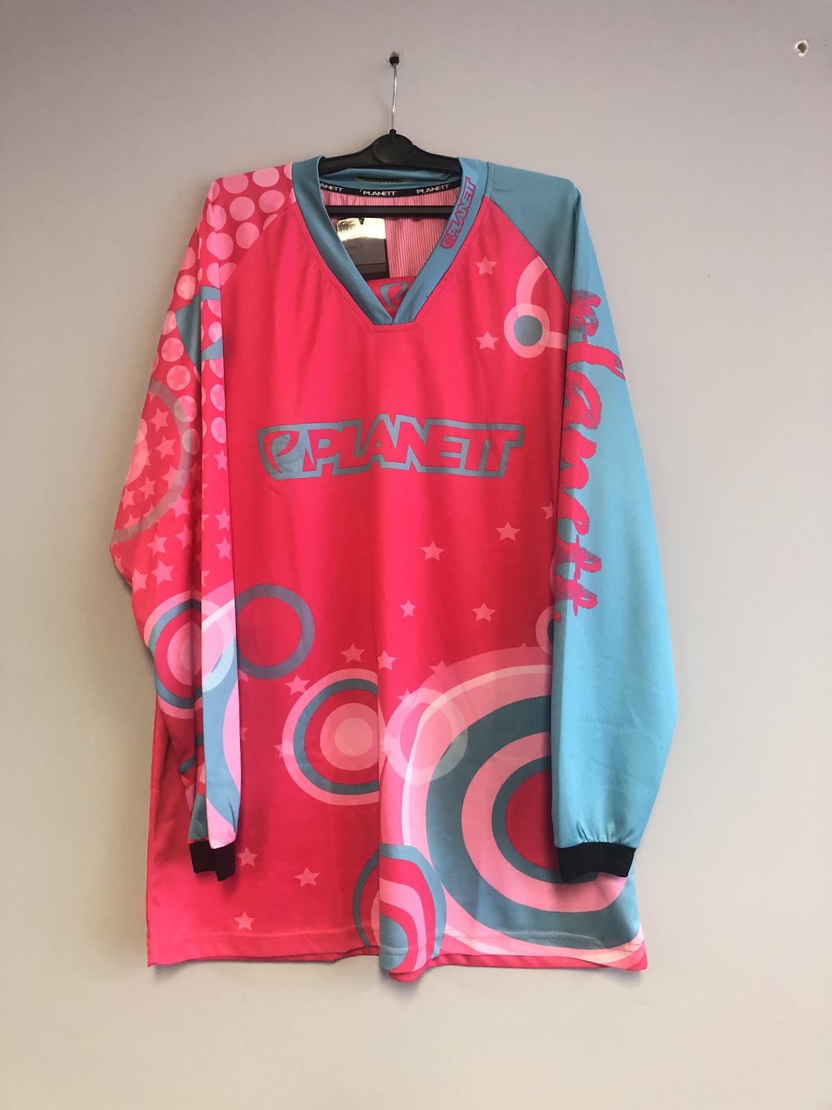teal and pink jersey